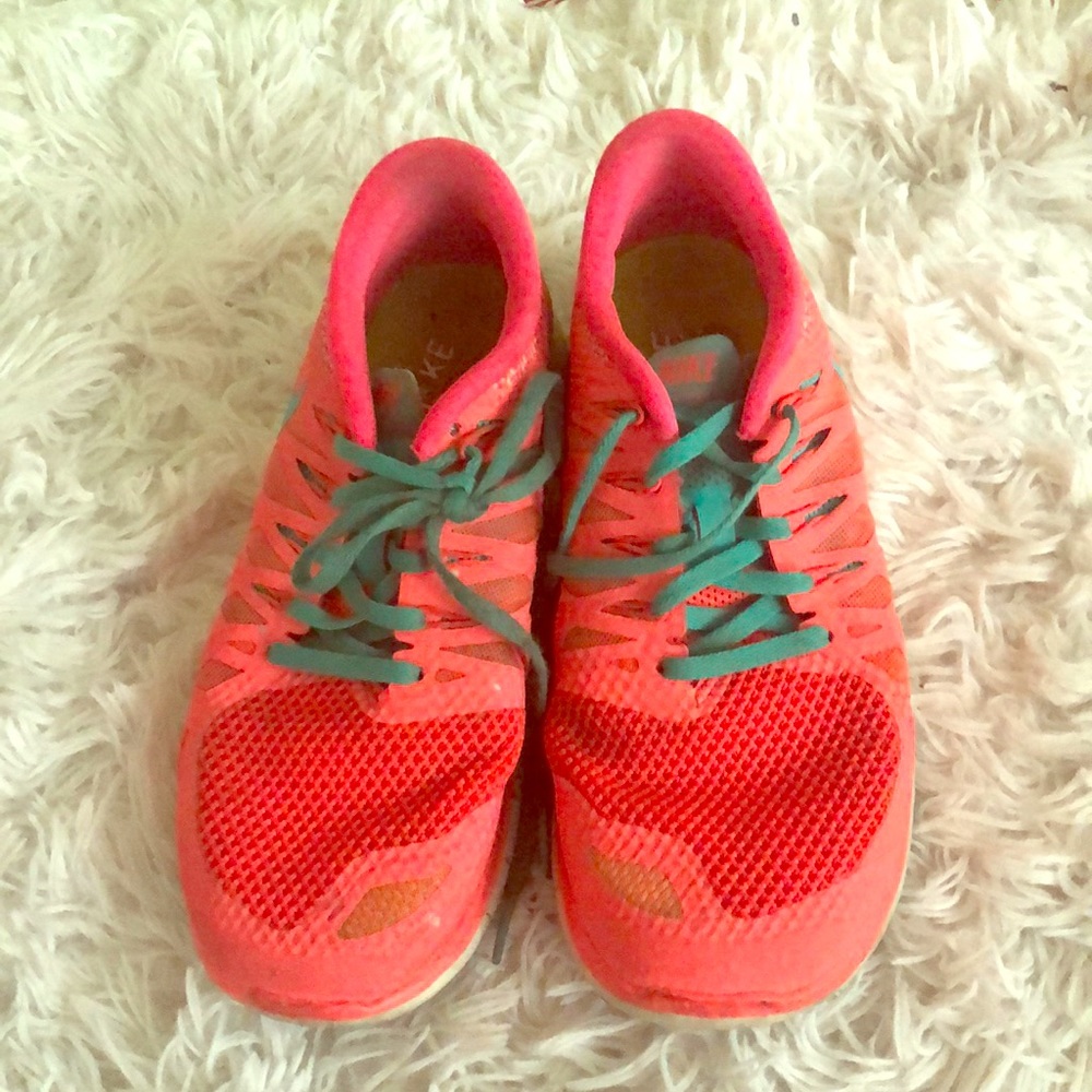 Pink and blue nike frees